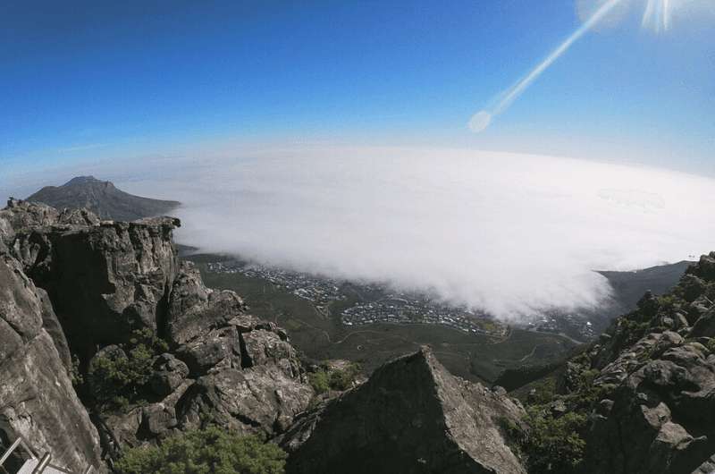 Tablecloth of clouds on Table Mountain in Cape Town, South Africa