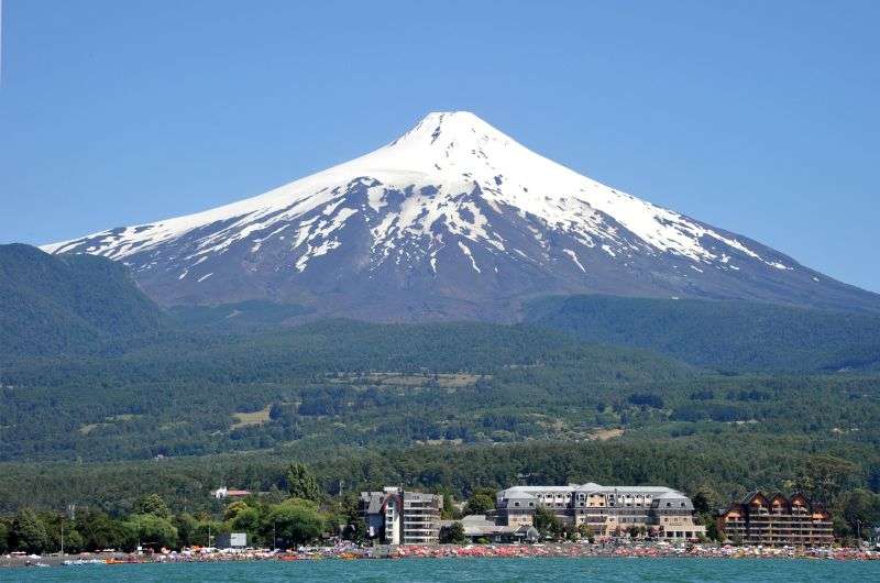 City of Pucón in Chile backed by huge volcano 