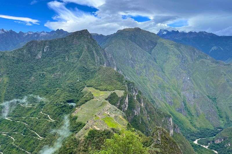 Machu Picchu from distance, photo by Next Level of Travel