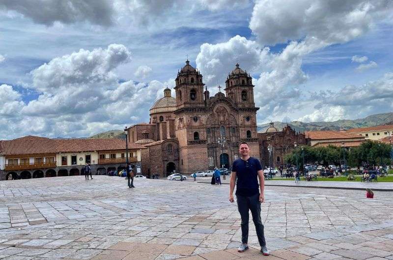 Tourist infront of the Cusco cathedral in Peru, photo by Next Level of Travel