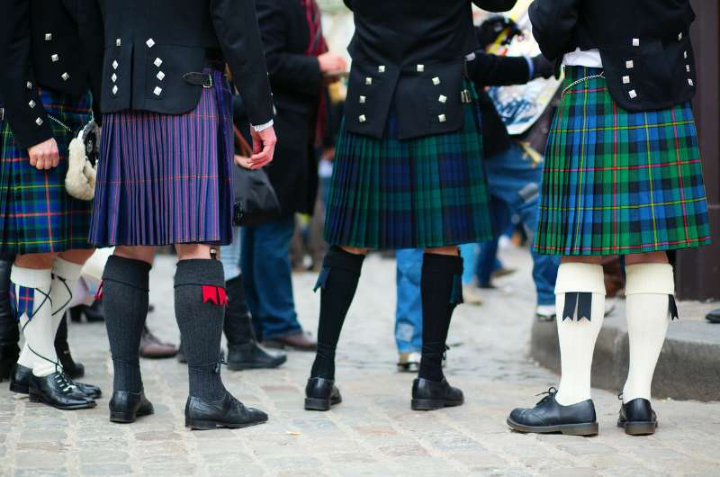 Different tartan patterns on kilts in Scotland