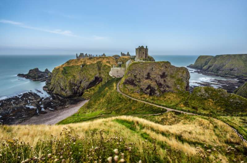 Dunnottar Castle surrounded by the North Sea in Scotland