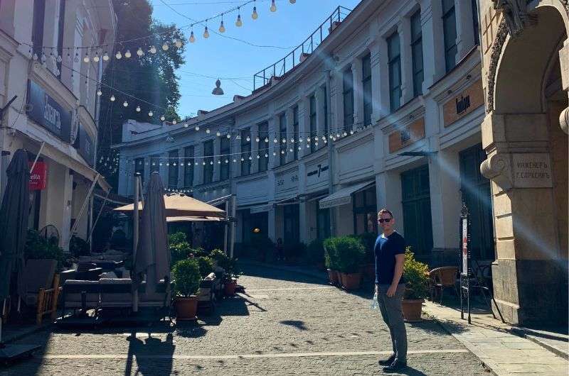 A tourist on the Jan Shardeni Street in Tbilisi, Georgia, photo by Next Level of Travel