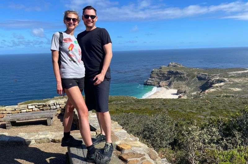 Two tourists visiting Cape of Good Hope—one of the best day trips from Cape Town, South Africa
