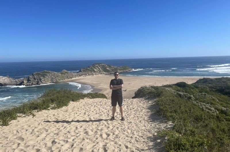 Standing on the beach on the Garden Route, South Africa