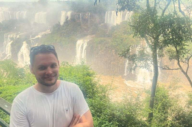 A tourist watching the Iguazu Falls in Argentina