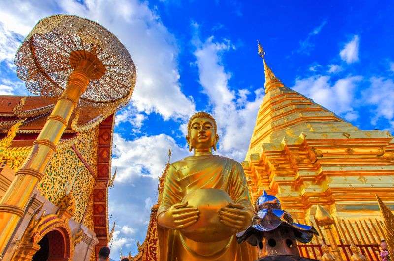 Golden statue at Wat Phra That in Chiang Mai, Thailand