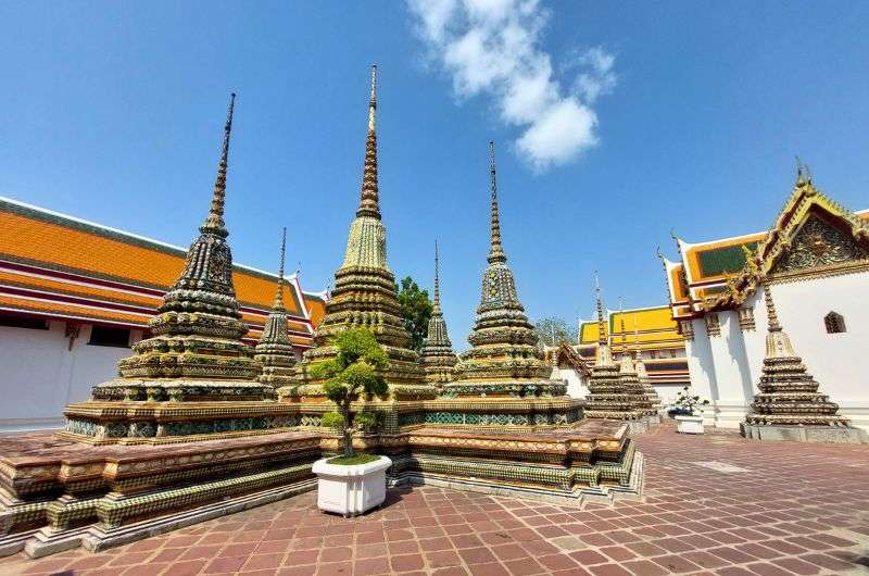 A 4 large chedis at Wat Pho in Bangkok, Thailand, itinerary by Next Level of Travel