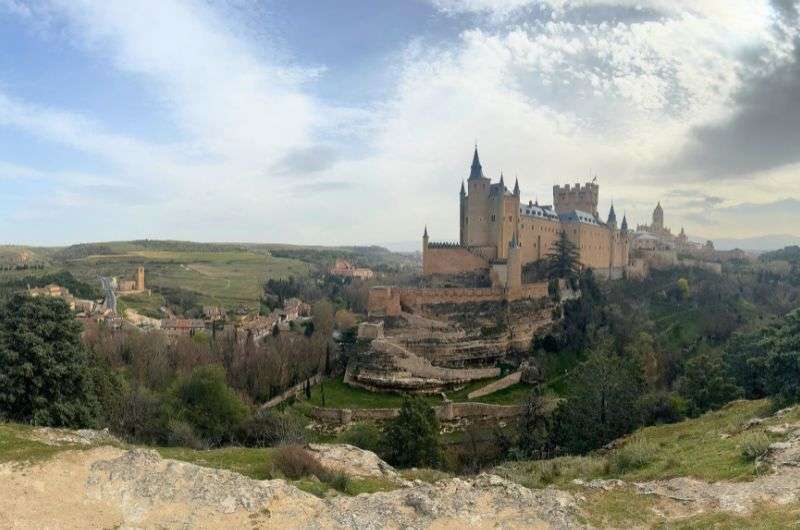 The Alcazar castle from the Mirador de La Pradera de San Marcos in Segovia, Spain, photo by Next Level of Travel