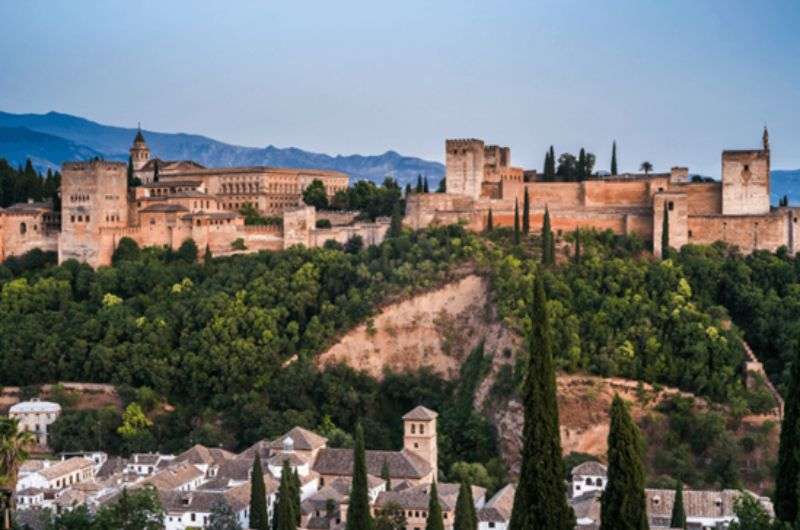 The view of the Alhambra from the Albaicin neighborhood at sunset, Spain itinerary