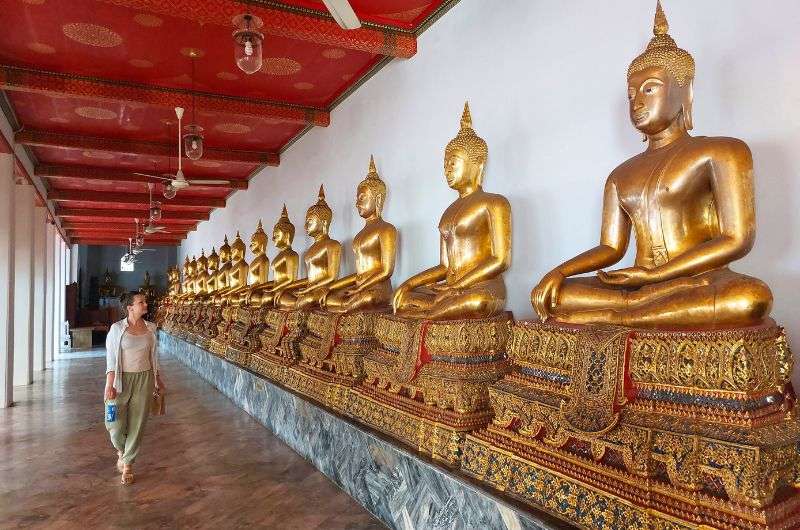 Statues in Wat Pho in Bangkok, Thailand, photo by Next Level of Travel