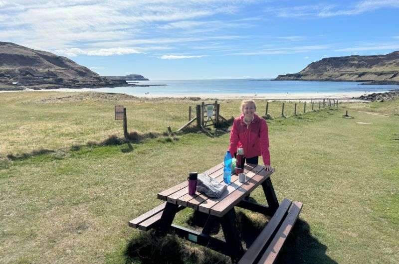 A tourist in Calgary Bay on Isle of Mull in Scotland, photo by Next Level of Travel