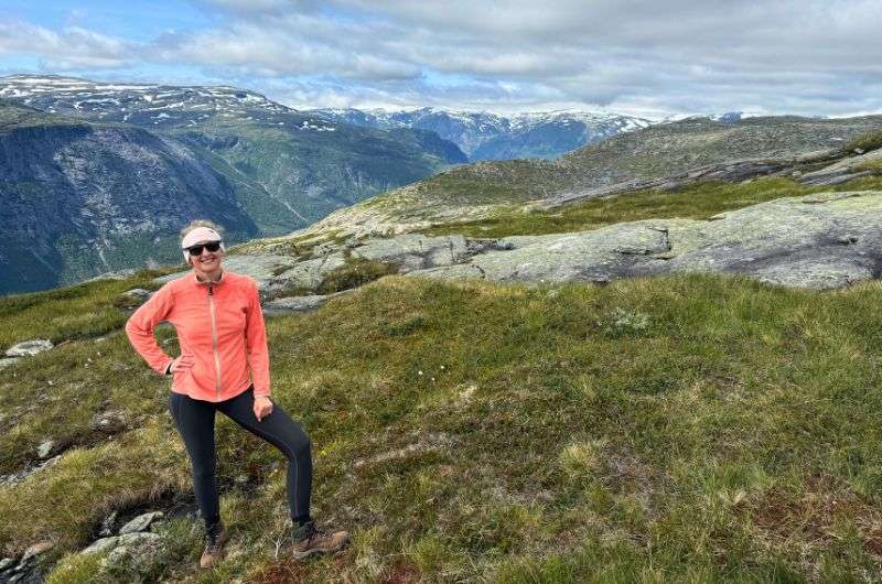 A tourist hiking the Trolltunga hike in Norway, photo by Next Level of Travel