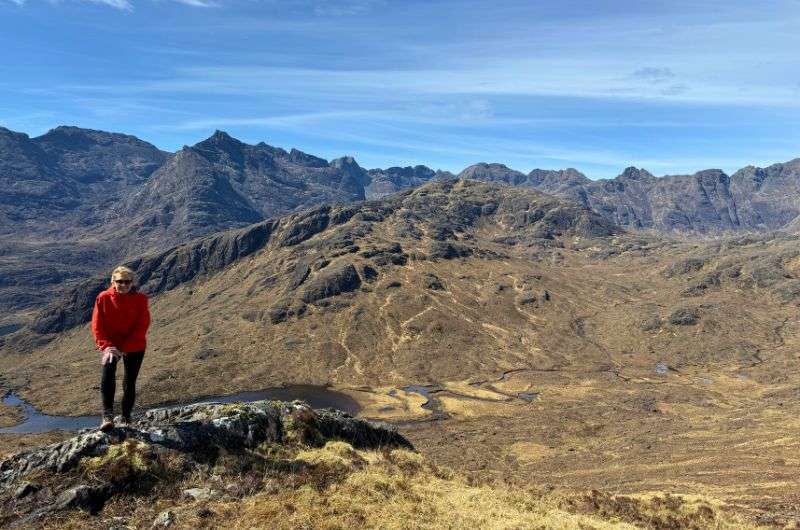 A tourist hiking around the Cuillin mountains in Scotland, photo by Next Level of Travel