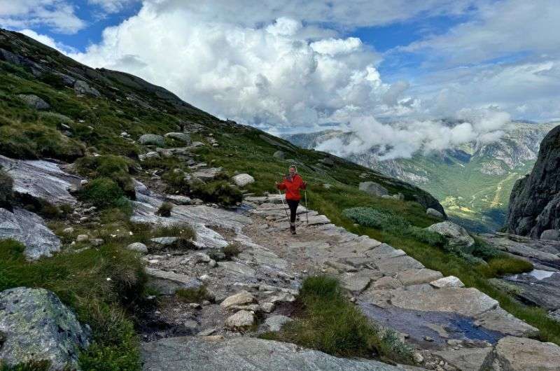 Female traveler on the Kjerag Hike in Norway, photo by Next Level of Travel