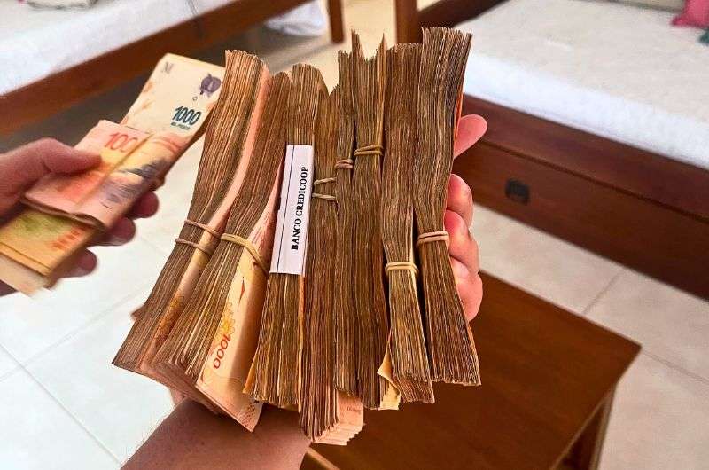 Argentine pesos, photo by Next Level of Travel