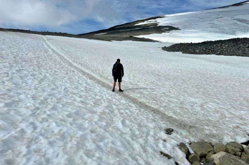 traveler experiencing the snow in Norway, photo by Next Level of Travel