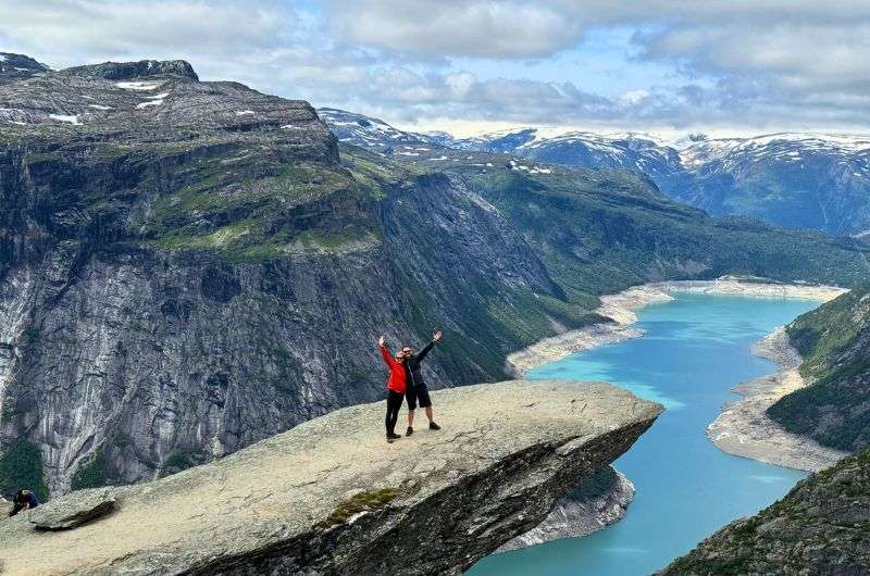 Tourists in the end of Trolltunga hike in Norway, photo by Next Level of Travel