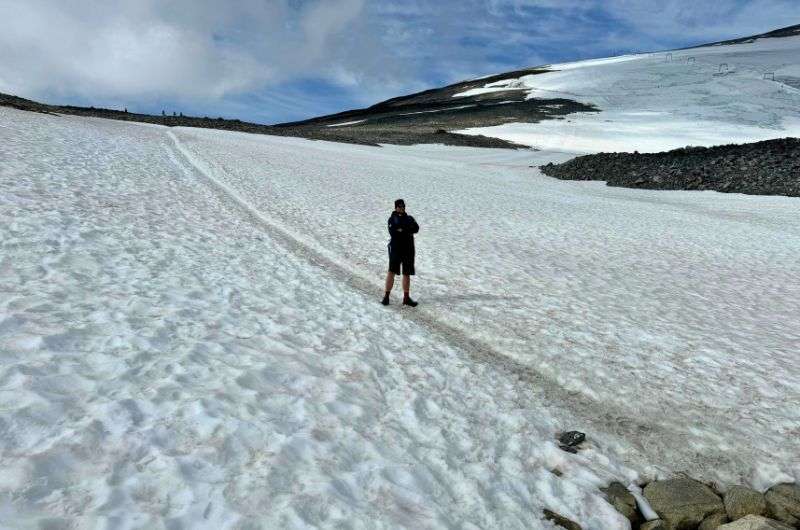 Traveler on the Galdhøpiggen hike in Norway, photo by Next Level of Travel