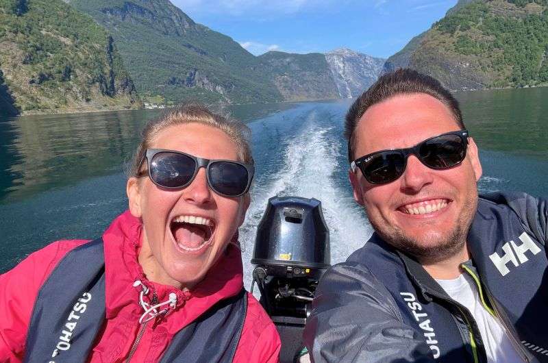 Two travelers on a boat in Flam, photo by Next Level of Travel