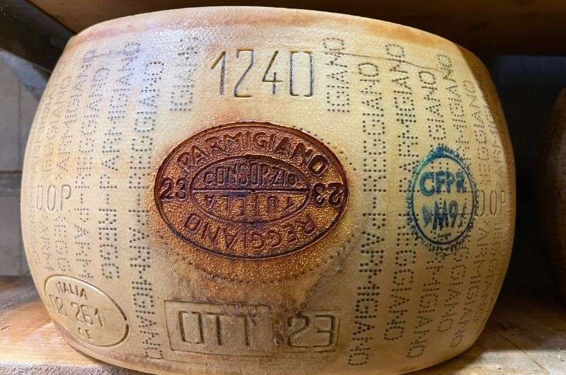 Parmigiano Reggiano in Madonne Cheese Factory in Medona, Italy, photo by Next Level of Travel