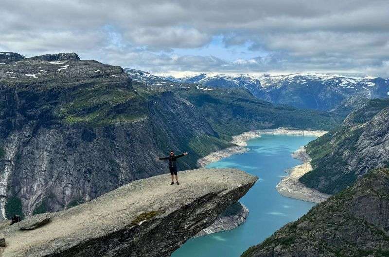 Conquering Trolltunga hike in Norway, photo by Next Level of Travel