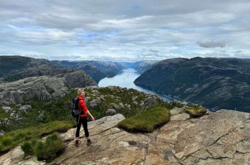 Traveler on the Pulpit Rock hike in Norway, photo by Next Level of Travel