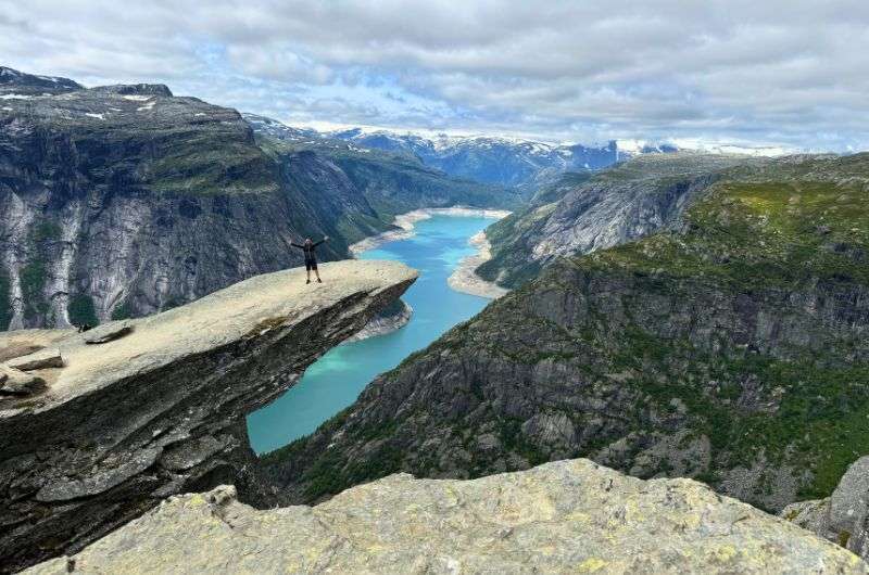 Traveler on the Trolltunga hike in Norway, photo by Next Level of Travel