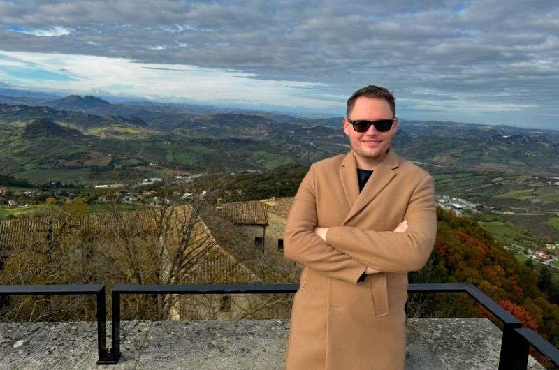 Traveler on a viewpoint in San Marino, Italy, photo by Next Level of Travel