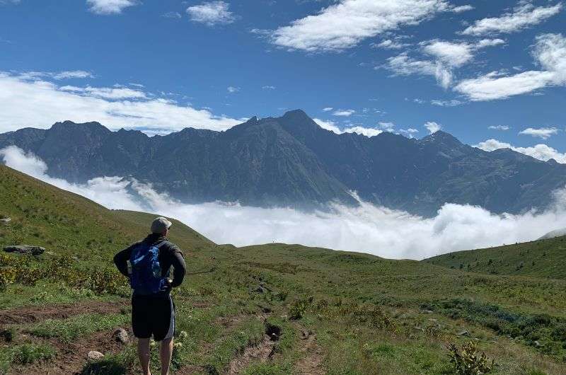 traveler Hiking in the Kazbeg Mountain, Georgia, photo by Next level of travel