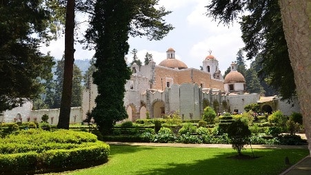 text: Visiting the convent in The Desert of Lions is one of the 14 cool things to do in Mexico City.